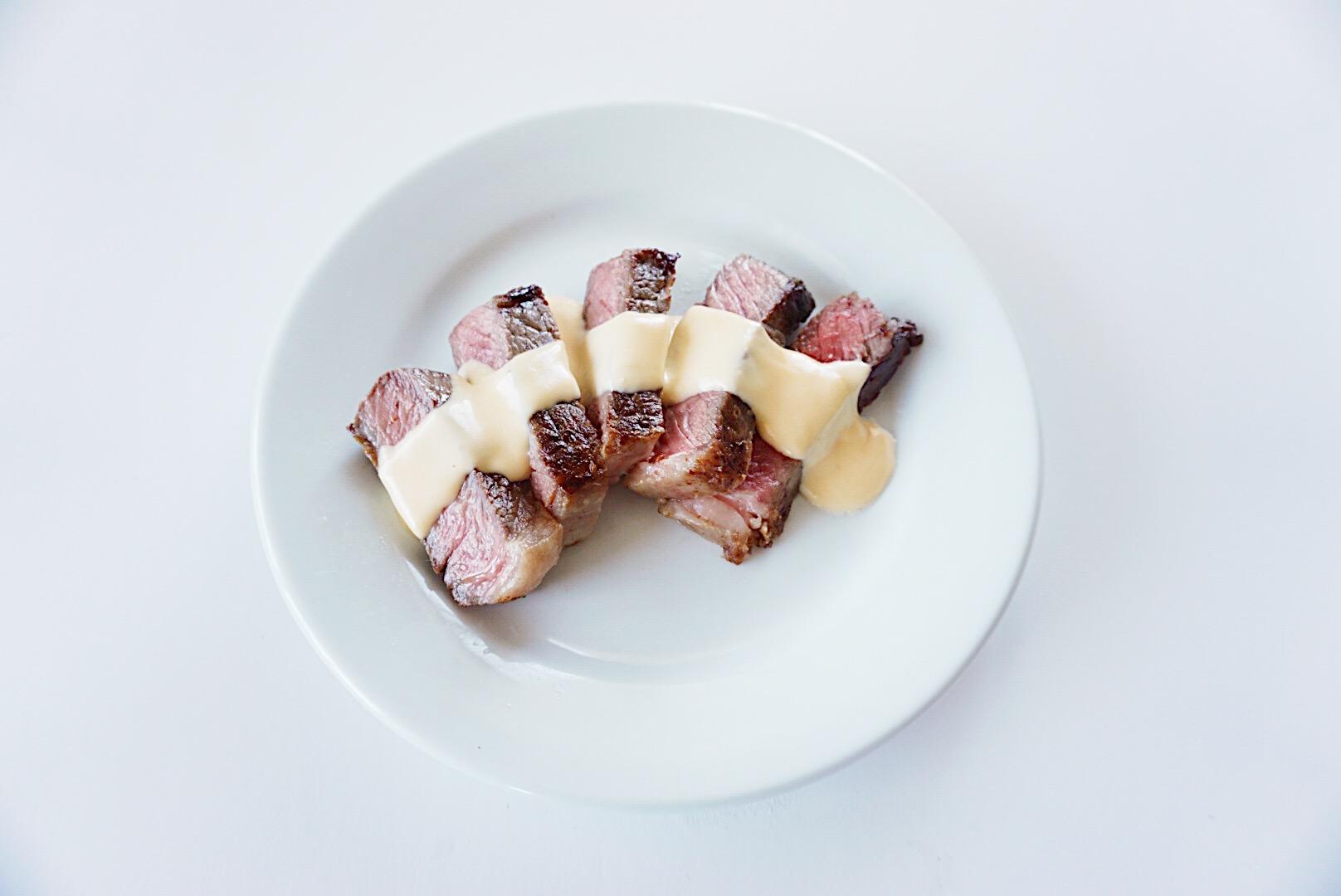 Strip Steak with Cheese Sauce